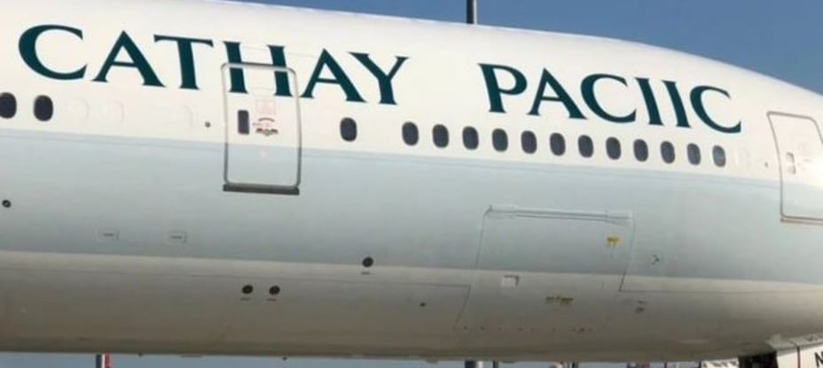 A plane that says Cathay Paciic on the side. Major typo.